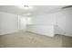 Open and bright hallway with carpeted floor and neutral walls at 747 Creekway Dr, Fuquay Varina, NC 27526