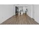 Bright living room with hardwood floors and an open floor plan at 747 Creekway Dr, Fuquay Varina, NC 27526