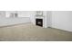Bright living room with a fireplace and carpeted floor at 747 Creekway Dr, Fuquay Varina, NC 27526