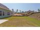 Spacious backyard with partial view of neighboring houses at 76 Brooklynn Trl, Angier, NC 27501