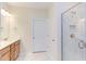Bathroom with double vanity, marble shower and tile floors at 76 Brooklynn Trl, Angier, NC 27501