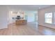 Open concept kitchen with a large island and stainless steel appliances at 76 Brooklynn Trl, Angier, NC 27501