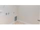 Laundry room with tile flooring and shelving at 76 Brooklynn Trl, Angier, NC 27501