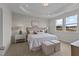 Main bedroom with plush carpet, large windows, and neutral tones at 81 Barn Door Dr, Lillington, NC 27546