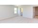 Well-lit bedroom with ensuite bathroom and walk-in closet at 86 Barn Door Dr, Lillington, NC 27546