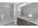 Modern bathroom with double vanity and walk-in shower at 86 Brooklynn Trl, Angier, NC 27501