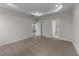 Bright bedroom with carpet flooring and two doorways at 86 Brooklynn Trl, Angier, NC 27501