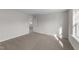 Bright bedroom with neutral walls and carpet at 86 Brooklynn Trl, Angier, NC 27501