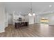 Spacious dining area with hardwood floors and access to kitchen at 86 Brooklynn Trl, Angier, NC 27501