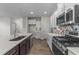 Modern kitchen features stainless steel appliances and an island at 86 Brooklynn Trl, Angier, NC 27501