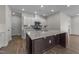 Modern kitchen with island and stainless steel appliances at 86 Brooklynn Trl, Angier, NC 27501