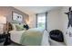 A bedroom with soccer-themed decor, including wallpaper and a framed print at 8705 Wardle Ct, Wake Forest, NC 27587