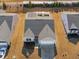 Aerial view of house, two-car garage, and backyard at 8798 Kenridge Ln, Fuquay Varina, NC 27526