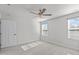 Spacious bedroom with ample natural light and ceiling fan at 8798 Kenridge Ln, Fuquay Varina, NC 27526