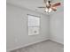 Bedroom with carpeted floor, ceiling fan, and window at 8798 Kenridge Ln, Fuquay Varina, NC 27526