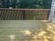 Well-maintained wooden deck with classic railings, perfect for enjoying the outdoors at 1003 Pagoda Pl, Knightdale, NC 27545