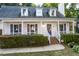 Two-story house with purple accents and a brick walkway at 1003 Pagoda Pl, Knightdale, NC 27545