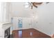 Bright living room with hardwood floors and a fireplace at 1003 Pagoda Pl, Knightdale, NC 27545