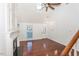 Living room with hardwood floors, high ceilings, and a fireplace at 1003 Pagoda Pl, Knightdale, NC 27545