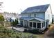 Exterior view of backyard featuring hot tub, patio, and screened porch at 104 Warm Wood Ln, Apex, NC 27539