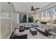 Relaxing screened porch with comfortable seating for enjoying the outdoors at 104 Warm Wood Ln, Apex, NC 27539