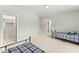 Bedroom with two twin beds and access to a closet at 1135 Laurelwood Dr, Durham, NC 27705