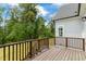Wooden deck overlooking wooded backyard at 1135 Laurelwood Dr, Durham, NC 27705