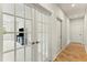 Upstairs hallway with french doors leading to a bonus room at 1135 Laurelwood Dr, Durham, NC 27705