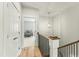 Upstairs hallway with access to bedrooms and linen closet at 1135 Laurelwood Dr, Durham, NC 27705