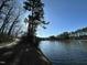 Scenic lake view with a walking path nearby at 1135 Laurelwood Dr, Durham, NC 27705