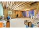 Large unfinished basement with exposed beams and framing at 1135 Laurelwood Dr, Durham, NC 27705