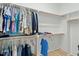 Spacious walk-in closet with ample shelving and hanging space at 1135 Laurelwood Dr, Durham, NC 27705