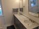 Elegant bathroom with double vanity and marble countertops at 1408 Brigham Rd, Chapel Hill, NC 27517