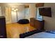 Bright bedroom with hardwood floors and large windows at 1408 Brigham Rd, Chapel Hill, NC 27517