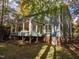 Gray house with a sunroom and deck at 1408 Brigham Rd, Chapel Hill, NC 27517