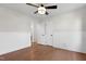 Bright bedroom with hardwood floors and ceiling fan at 1437 Huntly Ct, Cary, NC 27511