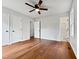 Spacious bedroom with hardwood floors, and ceiling fan at 1437 Huntly Ct, Cary, NC 27511