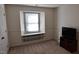 Bedroom with built-in shelving and window seat at 1511 Creekwood Ct # 102, Raleigh, NC 27603