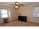 Spacious bedroom with neutral walls, window seating, and plush carpeting at 1511 Creekwood Ct # 102, Raleigh, NC 27603