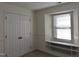 Bedroom with double door closet and window seat at 1511 Creekwood Ct # 102, Raleigh, NC 27603