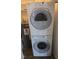 Stackable washer and dryer in laundry room at 1511 Creekwood Ct # 102, Raleigh, NC 27603