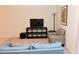 Living room with couches and a TV at 1511 Creekwood Ct # 102, Raleigh, NC 27603
