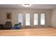 Living room with access to a patio at 1511 Creekwood Ct # 102, Raleigh, NC 27603