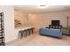 Open living room and kitchen with breakfast bar at 1511 Creekwood Ct # 102, Raleigh, NC 27603