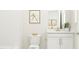 Clean bathroom with single vanity and bathtub at 1540 Goldfinch Perch Ln, Knightdale, NC 27545