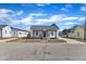 White cottage with a front porch and rocking chairs at 1605 Thompson St, Raleigh, NC 27603