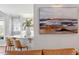 Kitchen with white cabinetry, quartz countertops, and breakfast bar at 1724 Bowling Green Trl, Raleigh, NC 27613