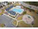Aerial view of the community pool, playground, and clubhouse, offering residents a variety of amenities at 200 Callandale Ln, Durham, NC 27703
