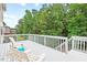 Enjoy outdoor living on this spacious deck with nature views at 200 Callandale Ln, Durham, NC 27703
