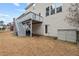 Spacious backyard showing deck stairs and ample outdoor storage at 200 Callandale Ln, Durham, NC 27703